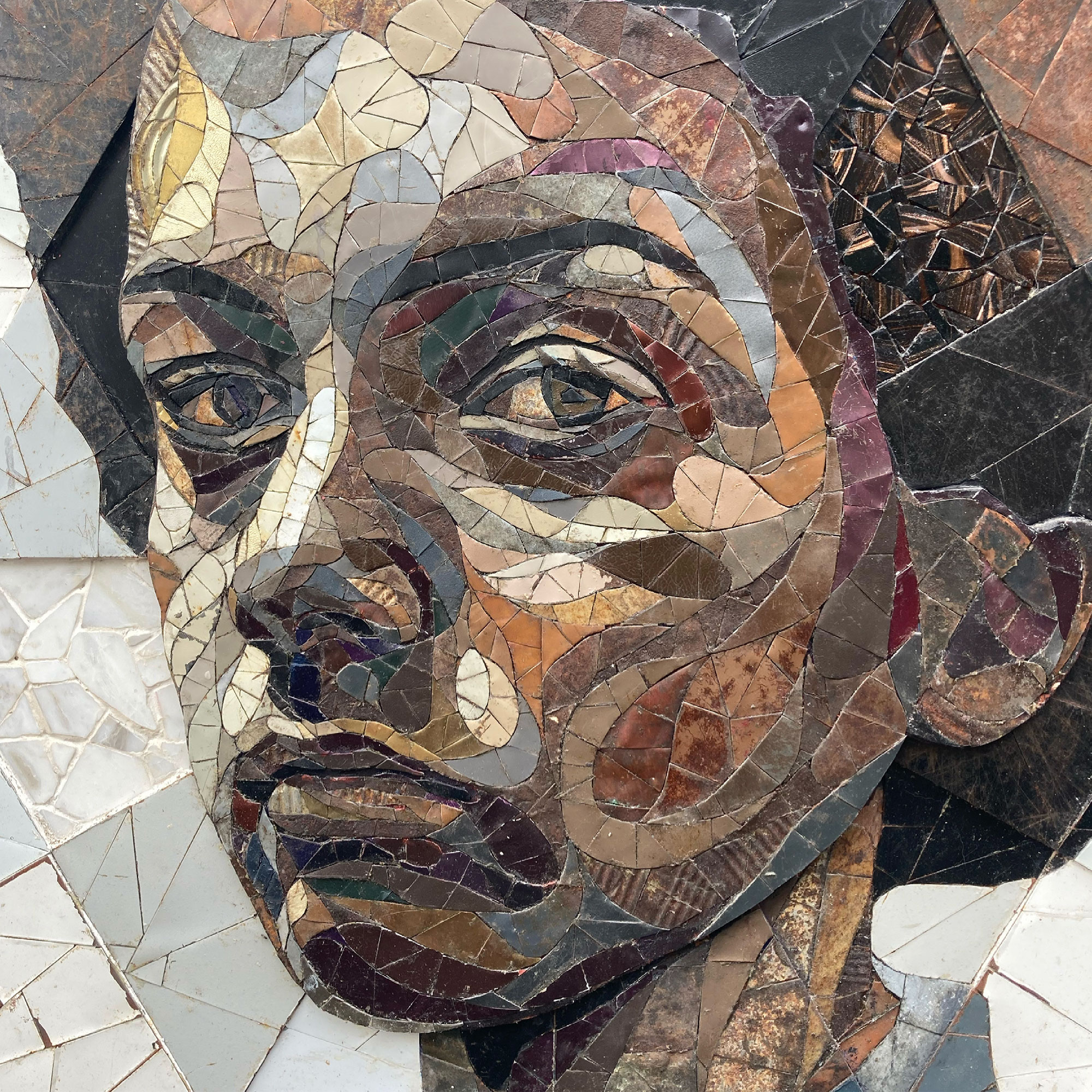 Expressive Portraits Made as Scrap-Metal Mosaics Question Societal Notions of Value